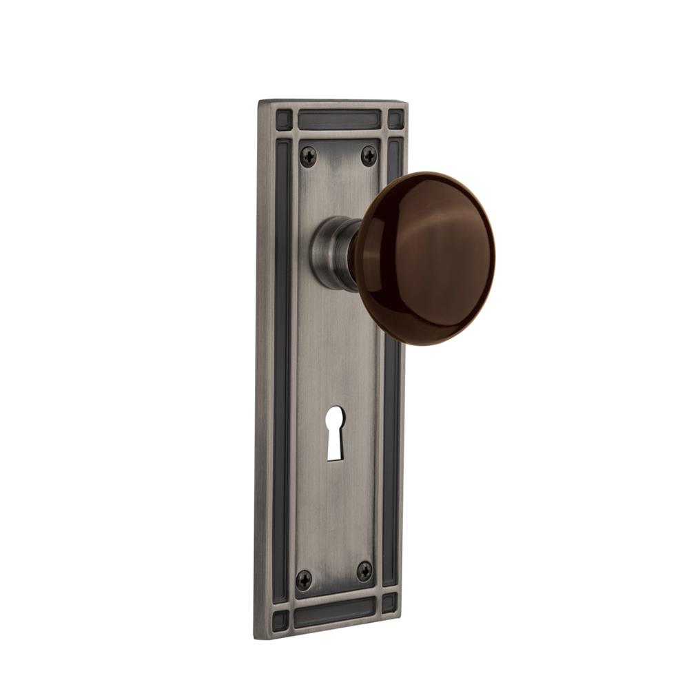 Nostalgic Warehouse MISBRN Mortise Mission Plate with Brown Porcelain Knob and Keyhole in Antique Pewter